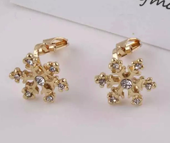 Clip on 1/2" silver or gold small snowflake earrings with clear stone