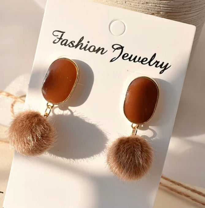 Trendy clip on 1 3/4" gold and brown fuzz ball dangle earrings