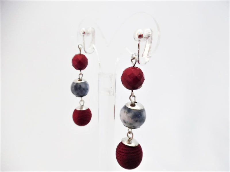 Clip on 2 3/4" silver burgundy/red thread and blue multi colored bead earrings