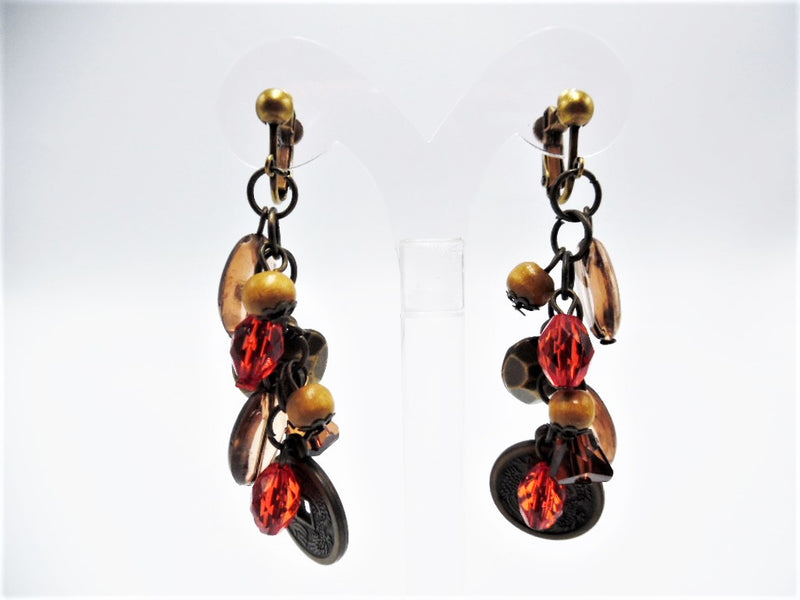 Clip on 3" long brass, brown, orange bead dangle heart earrings