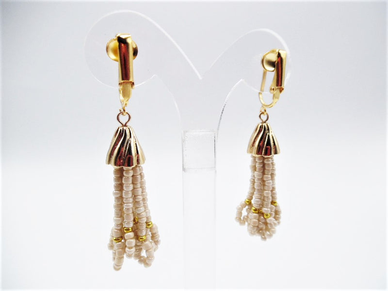Clip on 2 1/2" gold and tan dangle seed bead earrings