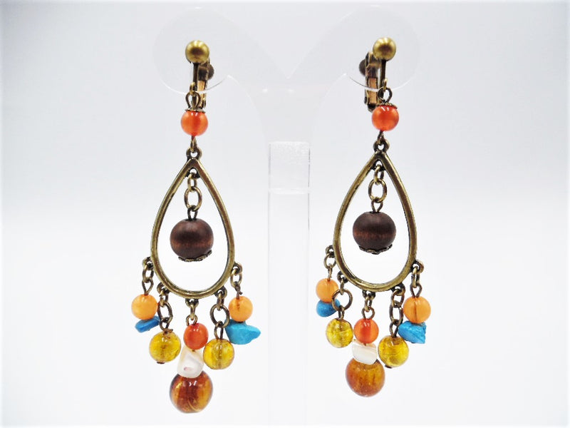 Clip on 3 1/2" brass teardrop earrings multi colored odd shaped beads