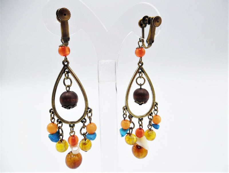 Clip on 3 1/2" brass teardrop earrings multi colored odd shaped beads