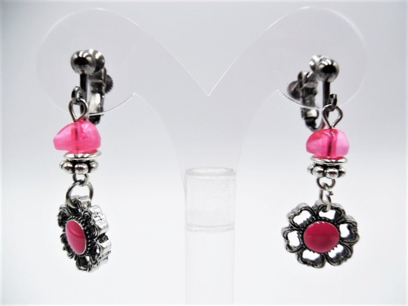 Clip on 1 3/4" silver earrings with dangle pink bead and flower