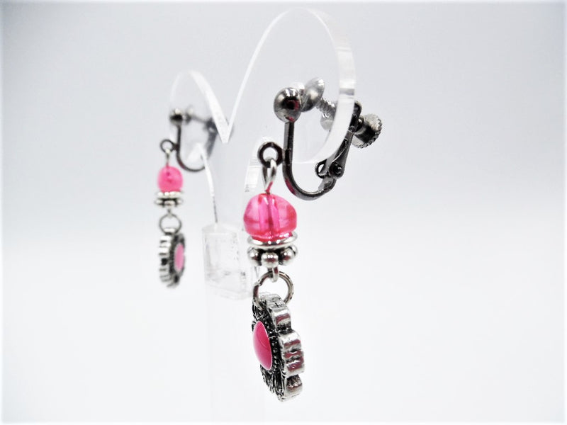 Clip on 1 3/4" silver earrings with dangle pink bead and flower