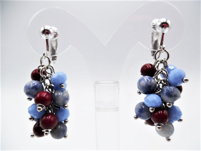 Clip on 1 3/4" silver earrings with dangle red, blue and silver beads