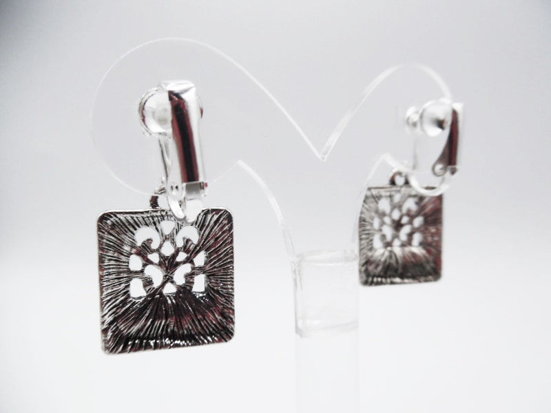 Clip on 1 1/2" silver hammered cutout square dangle earrings