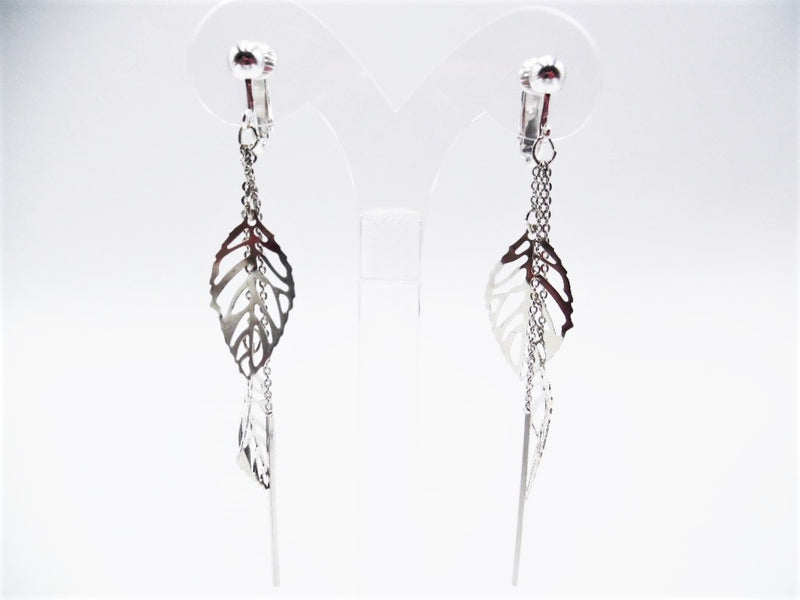 Clip on 3 1/2" silver chain dangle cutout leaves and stick earrings