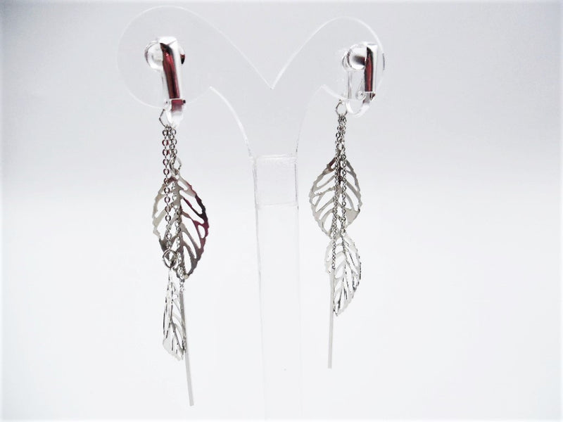 Clip on 3 1/2" silver chain dangle cutout leaves and stick earrings