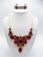 Gold pierced red stone flower necklace and earring set