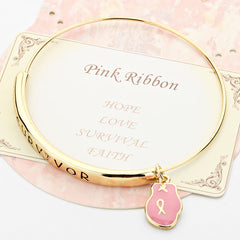 Gold and pink ribbon adjustable bangle bracelet with glove charm