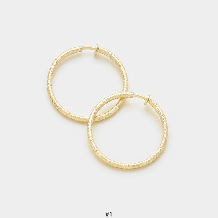 Clip on 1 1/4" small gold textured sparkle cut hoop earrings