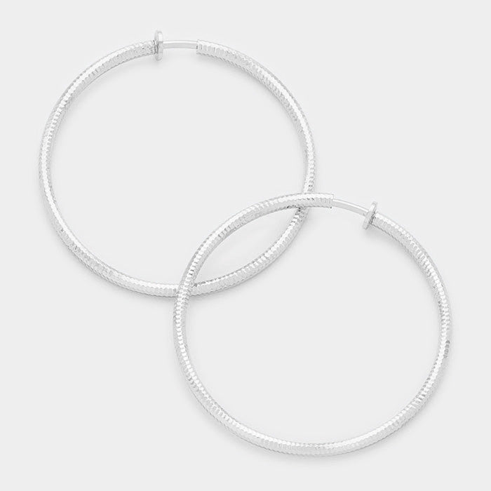 Clip on 3 1/4" silver textured twisted spring back hoop earrings