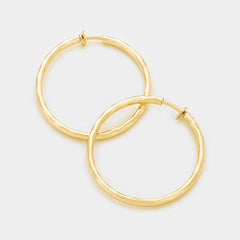 Clip on 1 1/4 gold hammered spring back hoop earrings