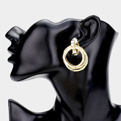 Clip on gold bent open back earrings