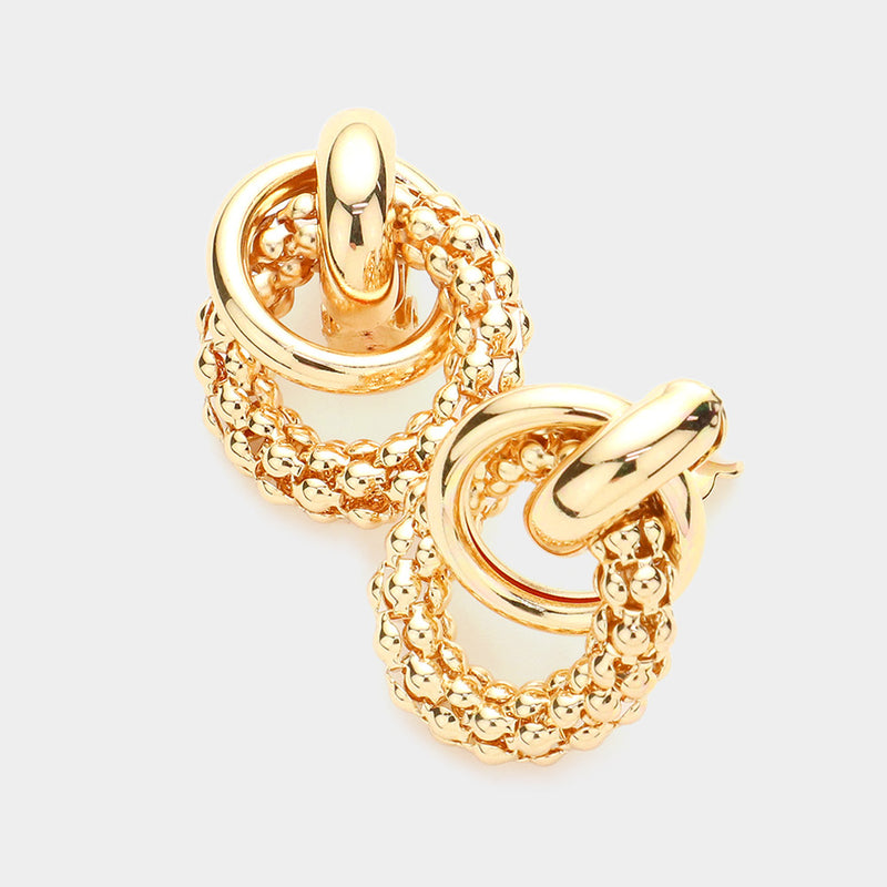Clip on 1 1/2" shiny gold and rope style knot earrings