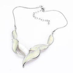 Pierced silver and white leaf necklace and earring set
