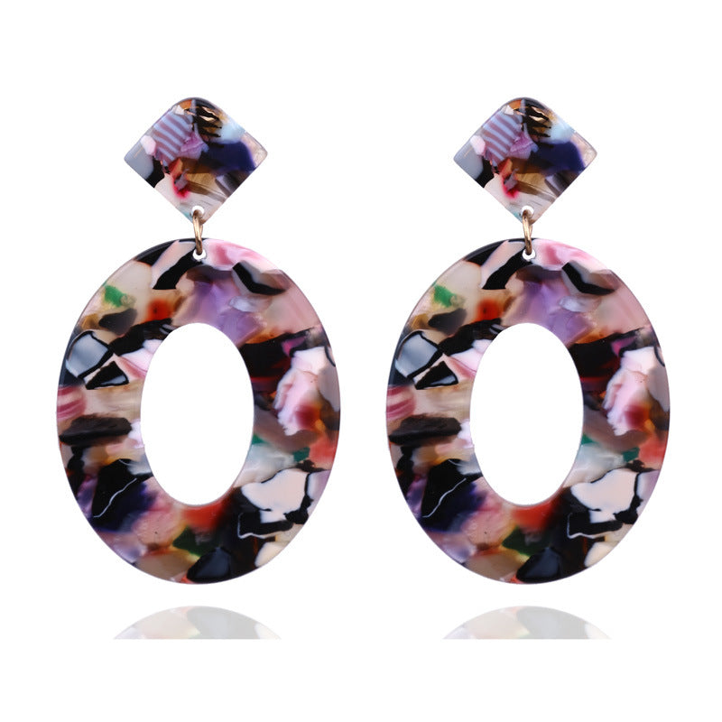 Clip on 2 3/4" gold plastic multi colored oval hoop earrings