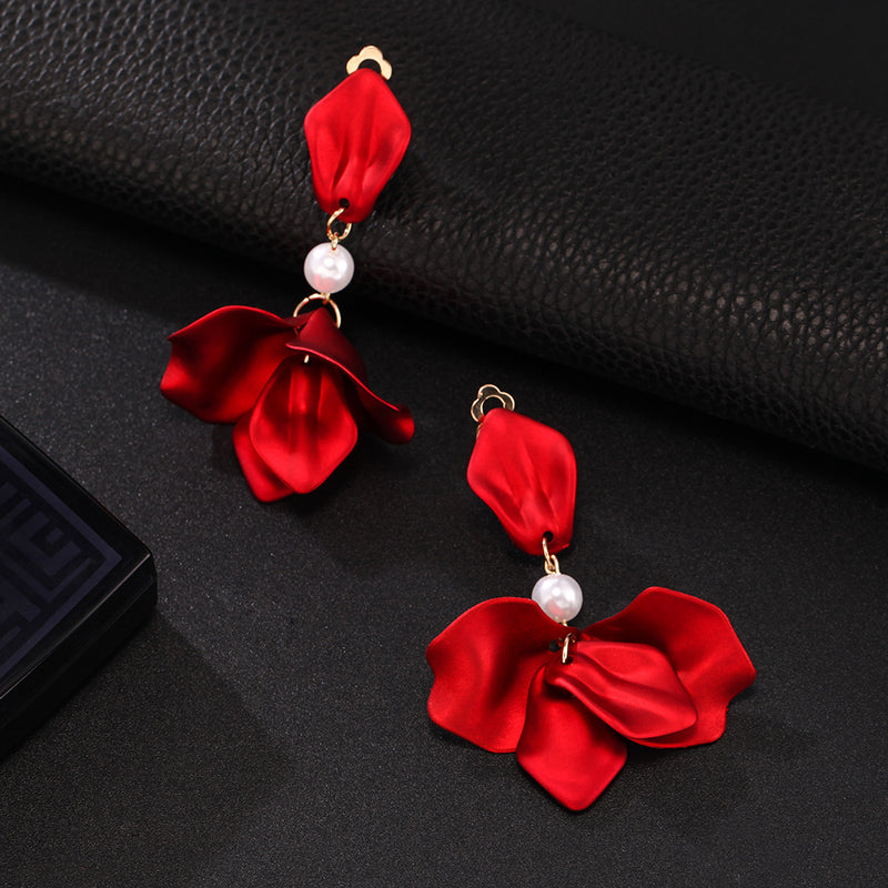 Classy 4 1/4" clip on red petal earrings with dangling chain and clear stones