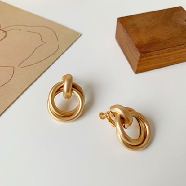 Clip 1 1/2" on matte gold large loose knot button style earrings