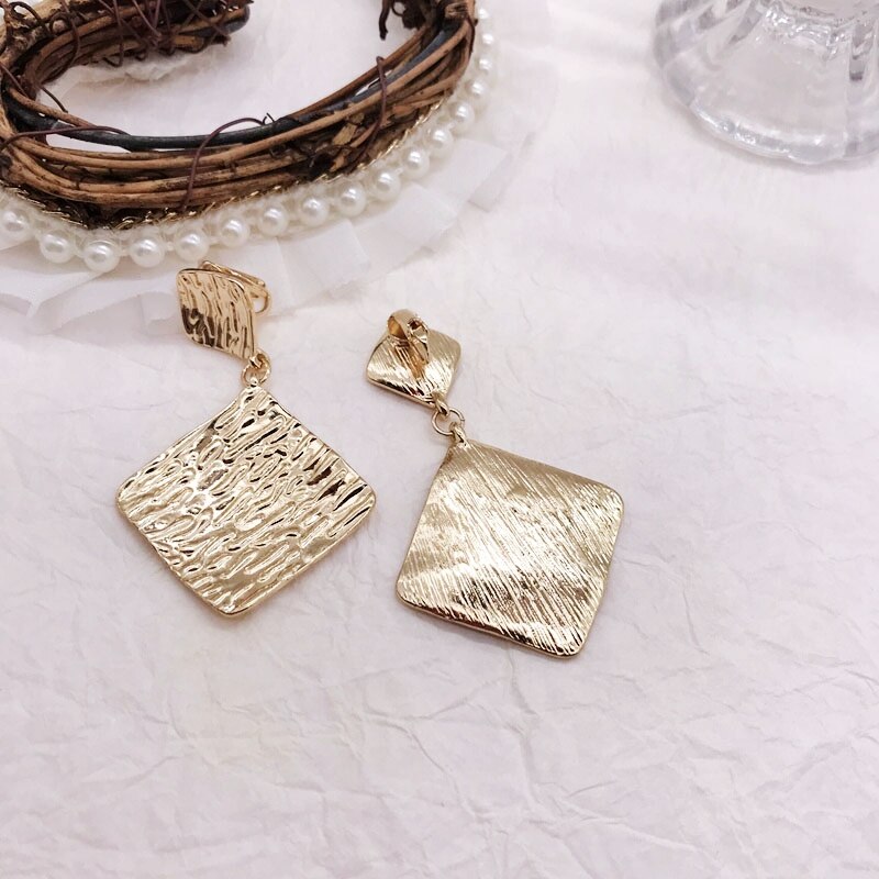 Clip on gold wrinkled dangle square earrings