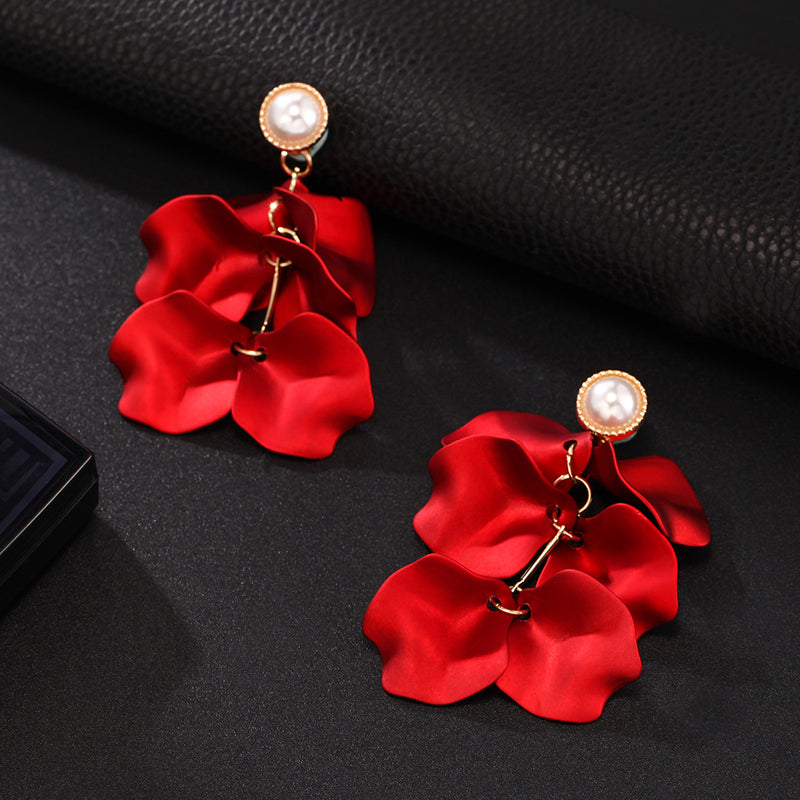 Classy clip on 2 3/4" long gold and red petal earrings with white pearl
