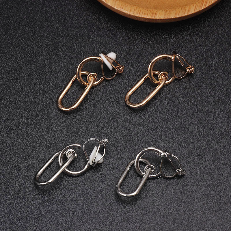 Clip on 1 1/4"  small silver or gold round and oval earrings