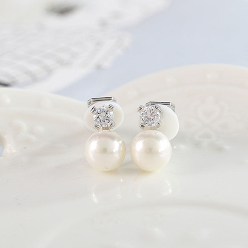 Clip on 1 1/2" silver clear stone and white pearl earrings