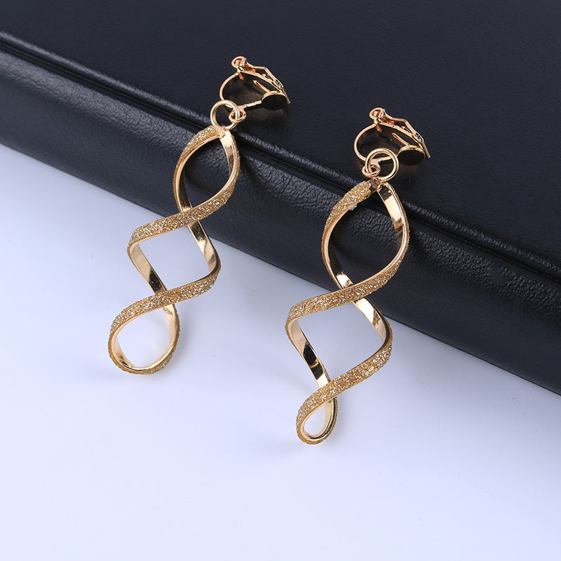 Clip on 2 1/4" gold glitter twisted dangle small clasp earrings