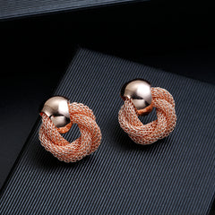 Clip on rose twisted door knob style open earrings