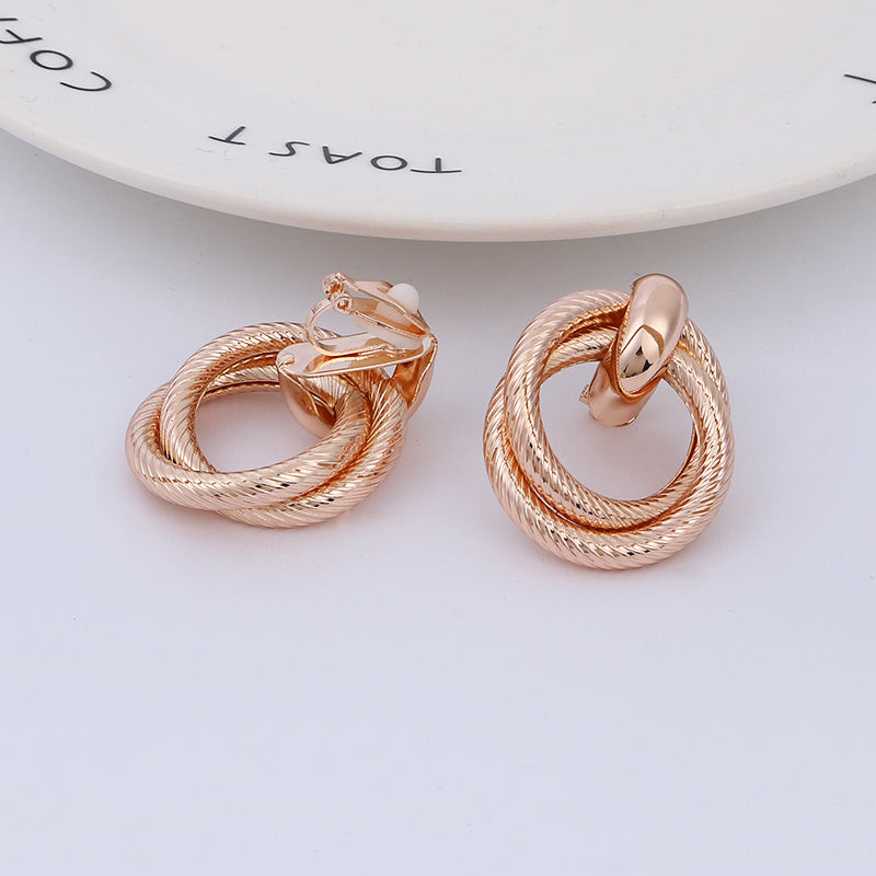 Clip on rose textured loose knot earrings
