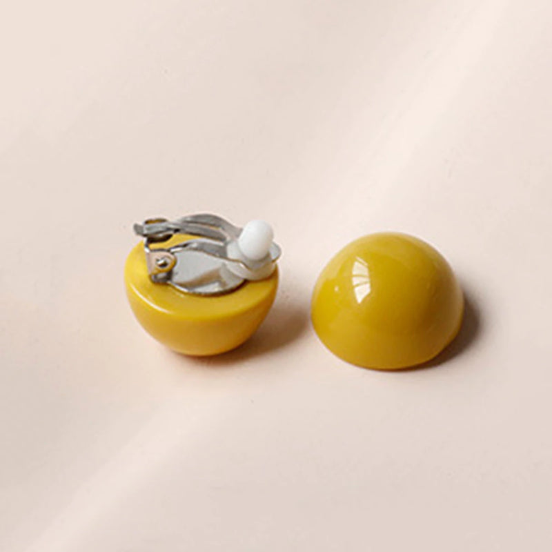 Clip on silver and gold round plastic earrings