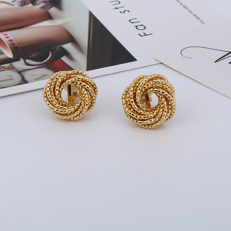 Clip on gold multi strand textured knot button earrings
