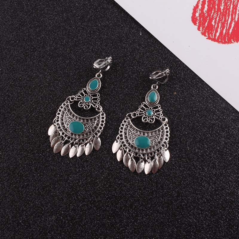 Clip on 2 1/2" silver and turquoise stone earrings with dangle pieces