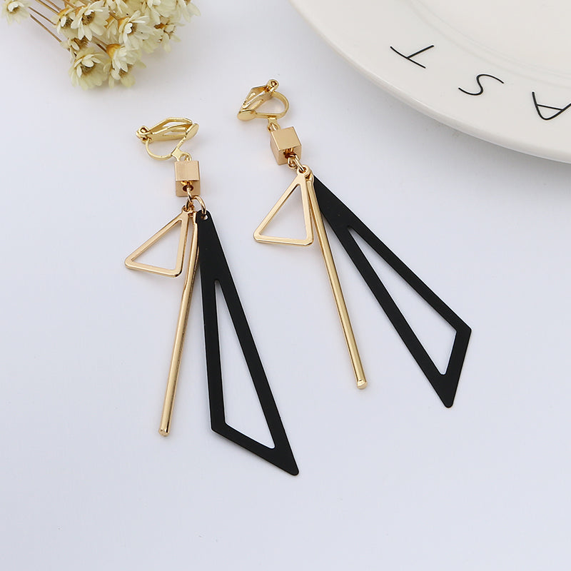 Clip on 3 1/4" gold and black odd shaped dangle earrings