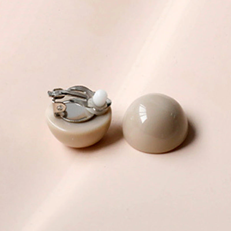 Clip on silver and taupe round plastic earrings