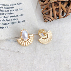 Clip on matte gold white pearl earrings with fan bottom