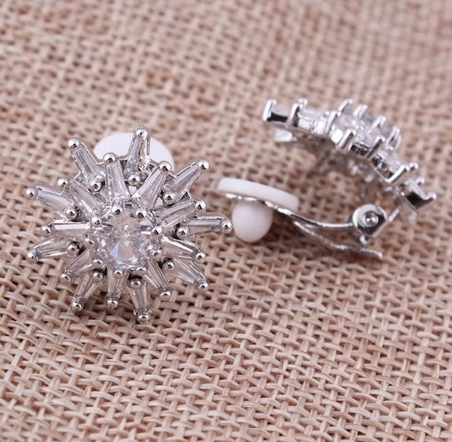 Clip on 1" silver or gold clear straight stone starburst button style earrings