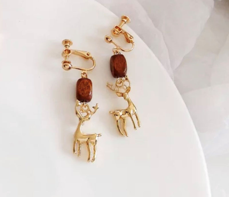Clip on 2" gold and brown wood dangle reindeer earrings