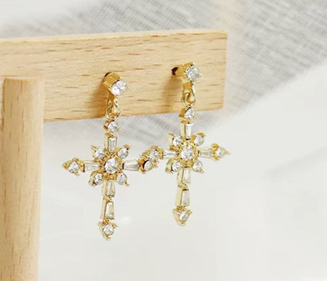 Clip on 1 1/2" gold and clear stone dangle pointed cross earrings