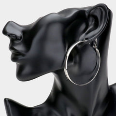 Shiny silver wide pierced hoop earrings