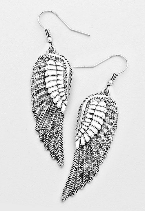 Pierced 2 3/4" silver textured dangle wing earrings
