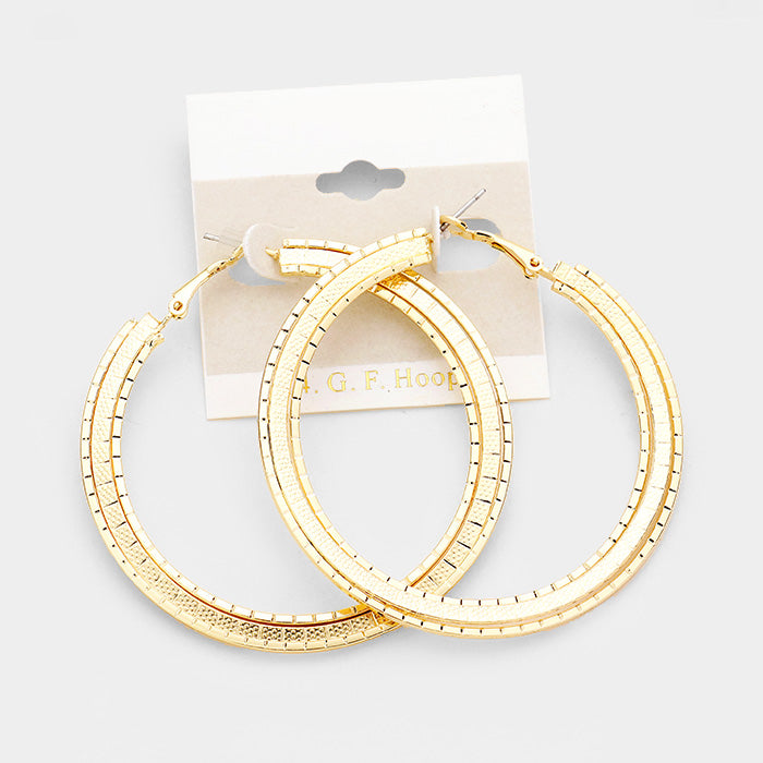 Trendy gold large flat 14k G.F. textured pierced hoop earrings