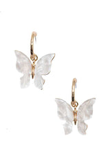 Pierced gold hoop and white butterfly earrings