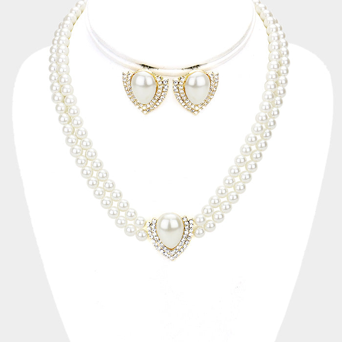 Pierced silver and .02 white pearl two strand necklace set.