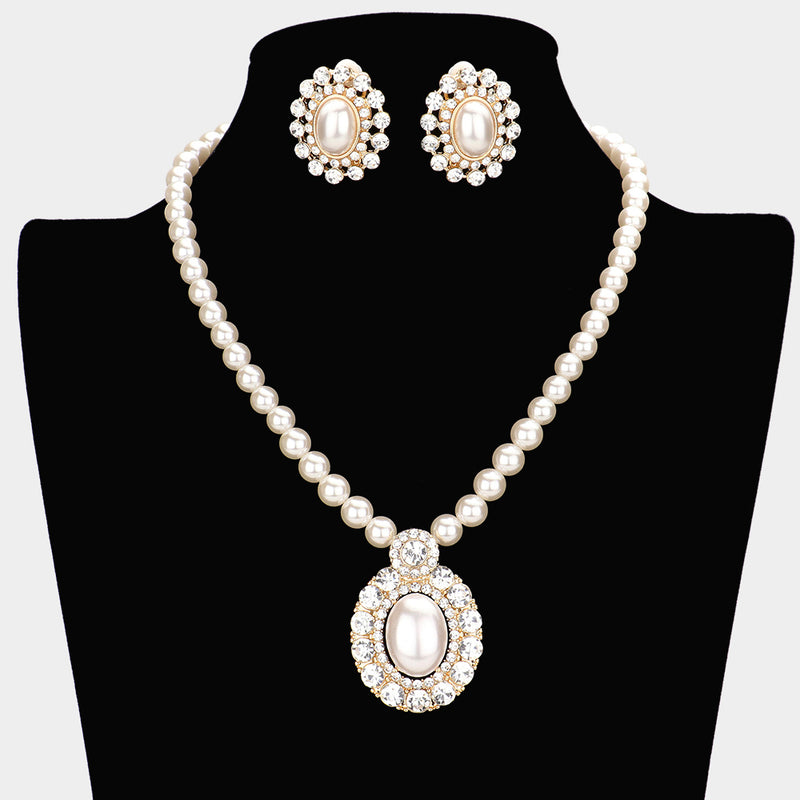 Clip on gold and cream pearl oval pendant necklace set with clear stones