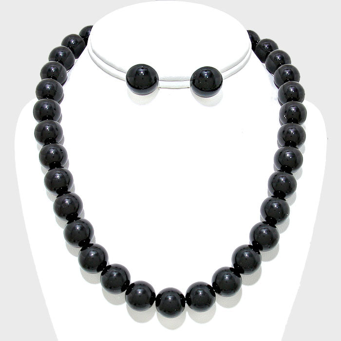 Pierced silver and black bead necklace and earring set