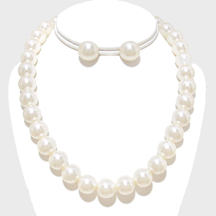 Pierced cream .04 pearl necklace and flat earring set