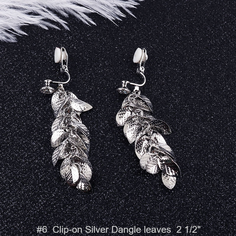 Clip on 2 1/2" silver long leaf cluster earrings with top clear stone