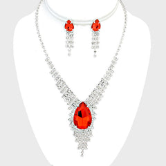 Pierced silver clear and red stone dangle necklace and earring set